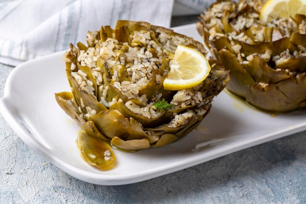 Fresh delicious stuffed artichoke best Turkish food Turkish name Zeytinyagli Enginar Dolmasi