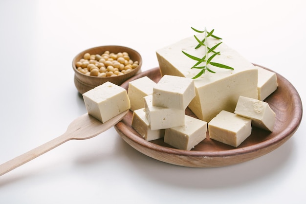 fresh diced tofu on a wooden bowl