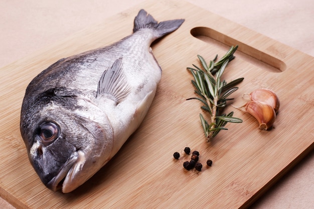 Fresh dorado seafood  on a wooden plank - Stock imageon