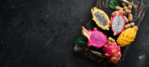 Fresh Dragon Fruit on a Black Background Tropical Fruits Top view Free space for text