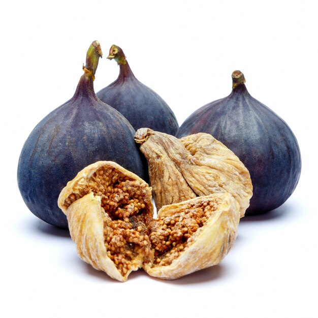 Fresh and dried Fig on white . 