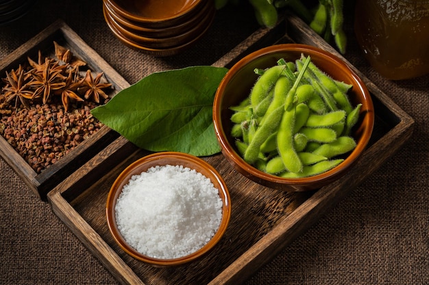 Fresh edamame on a wooden plate