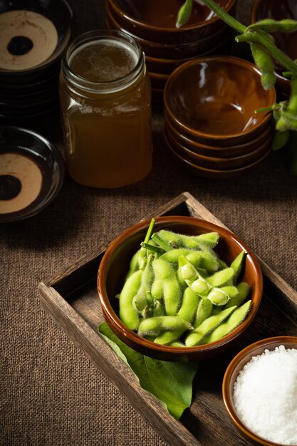 Fresh edamame on a wooden plate