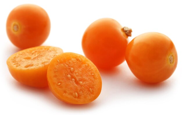 Fresh edible physalis over white background