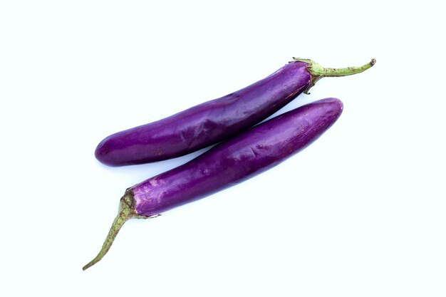 Fresh eggplant on white background. copy space