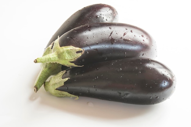 Fresh eggplant white background