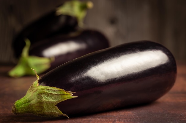 Fresh eggplants on the table