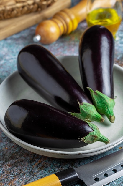Fresh eggplants on the table