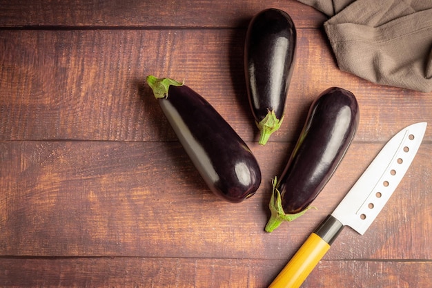 Fresh eggplants on the table