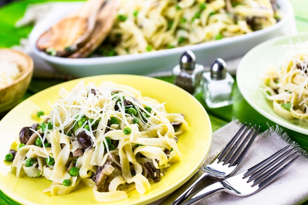 Fresh fettuccine with creamy mushroom sauce.