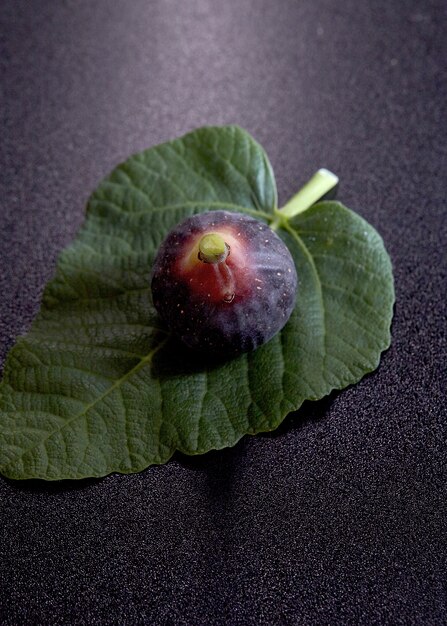 Fresh figs on black background