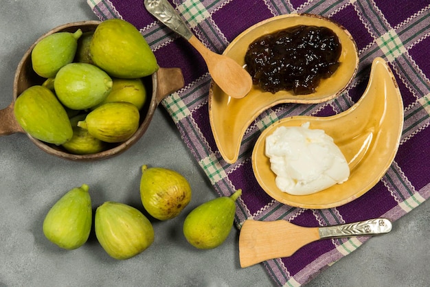 Fresh figs with ingredients on the table