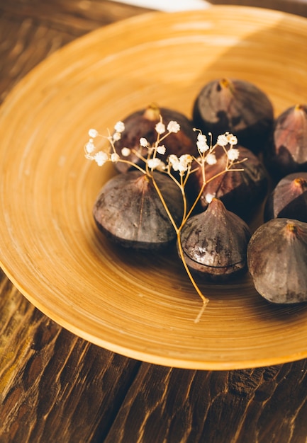 fresh figs on a wooden background