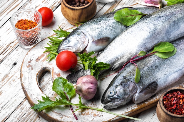 Fresh fish on wooden background