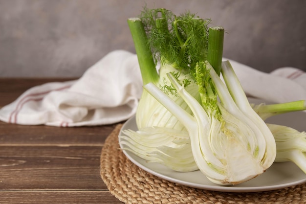 Fresh Florence fennel bulbs or Fennel bulb on wooden background Healthy and benefits of Florence fennel bulbs