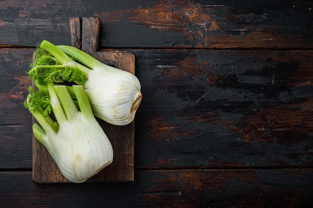 Fresh florence fennel bulbs on old wooden table