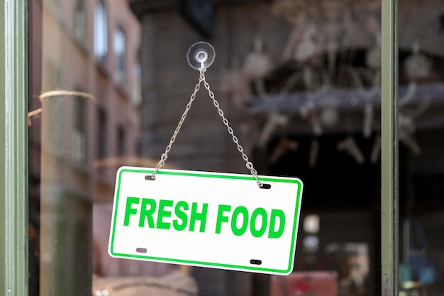 fresh food sign in a store window