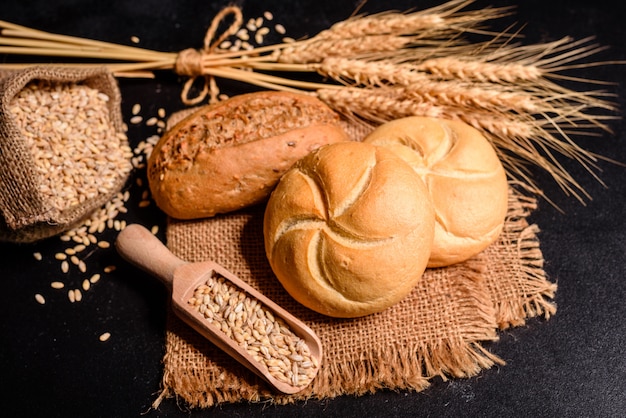 Fresh fragrant bread with grains and cones 