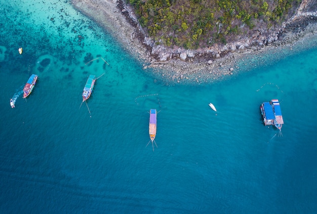 Fresh freedom concept. Adventure day and tourist. Top view of speedboat in the blue sea 