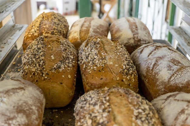 Fresh French bread on a white background. A loaf of bread. Fresh pastries, white bread, flour products. Food.