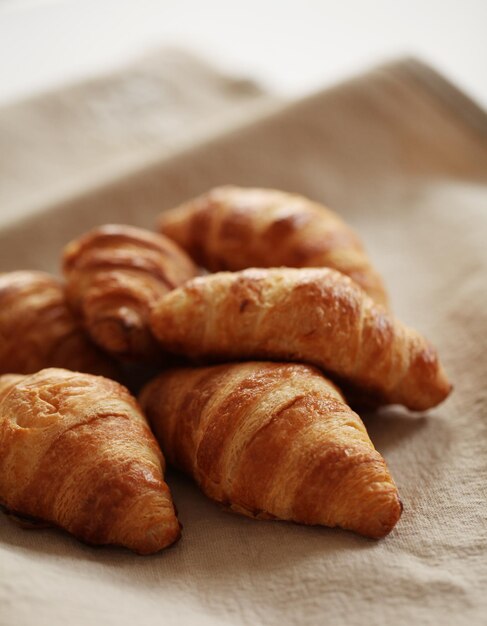 Fresh french croissants on a tablecloth