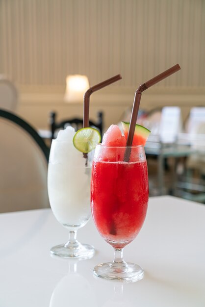 Fresh fruit cocktails with straws