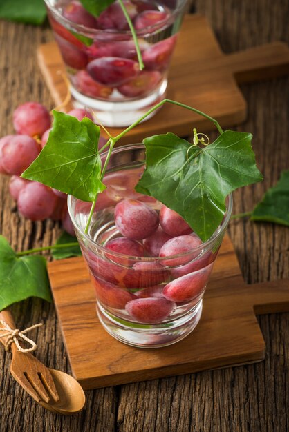 fresh fruit Flavour infused water of grape on wood