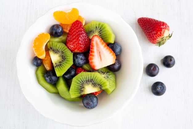 Fresh fruit salad in a white plate 