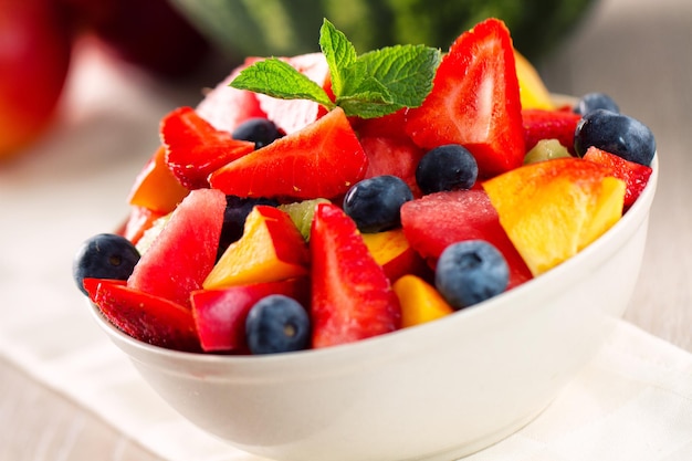 Fresh fruit salad with strawberries blueberries watermelon and peaches