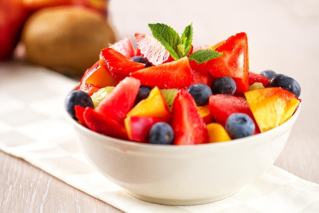 Fresh fruit salad with strawberries blueberries watermelon and peaches