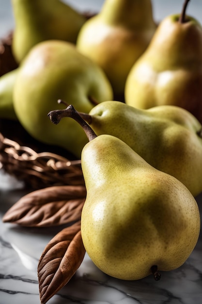 Fresh fruit slice and whole pears next to a decorative branch on marble background