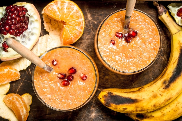 Fresh fruit smoothie. on rustic background