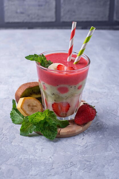 Fresh fruit smoothie with strawberry, banana and kiwi