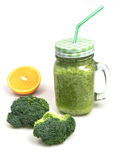 Photo fresh fruit vegetable broccoli celery smoothie, shake lime green. detox cocktail