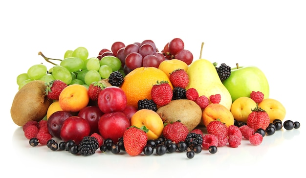 Fresh fruits and berries isolated on white