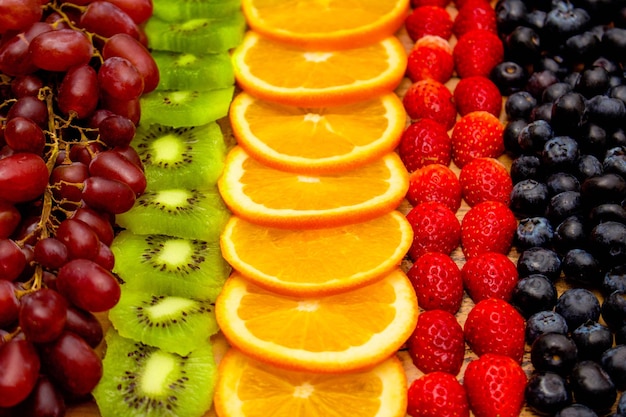 Fresh fruits concept Arrangement in row of colorful fruits healthy as background