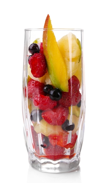 Fresh fruits salad in glass isolated on white surface