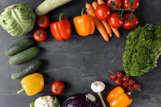 Fresh fruits and vegetables On a black background Banner Top view Healthy food concept