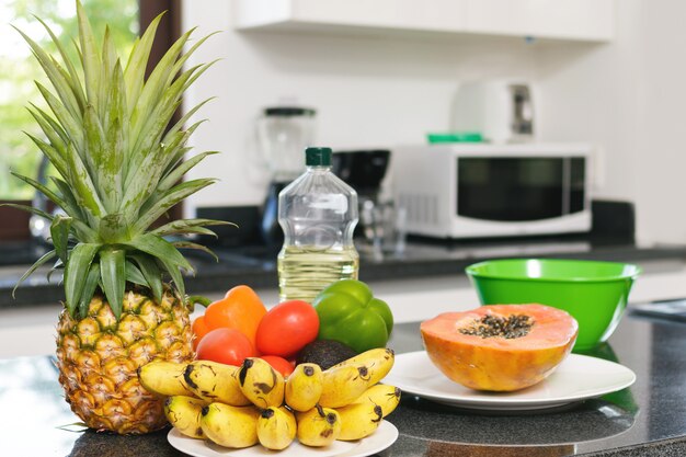 Fresh fruits and vegetables in the kitchen