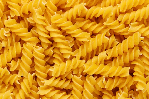Fresh fusilli pasta background