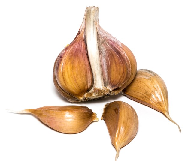 Fresh garlic isolated on white background close-up.