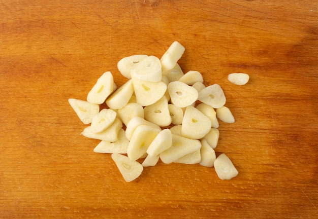 Fresh Garlic Parts on Wood table