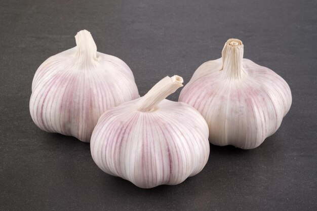 Fresh garlic on stone table