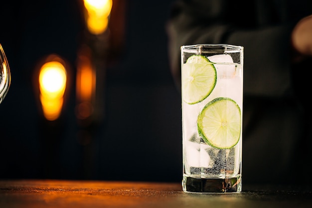 Fresh gin tonic cocktail with rosemary and lime