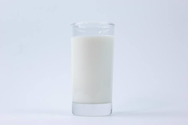 A fresh glass of milk isolated on white background