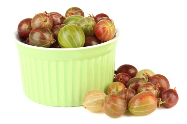 Fresh gooseberries in bowl isolated on white