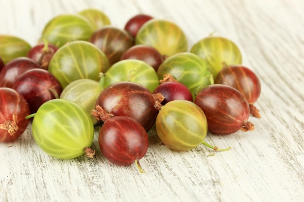 Fresh gooseberries on table closeup