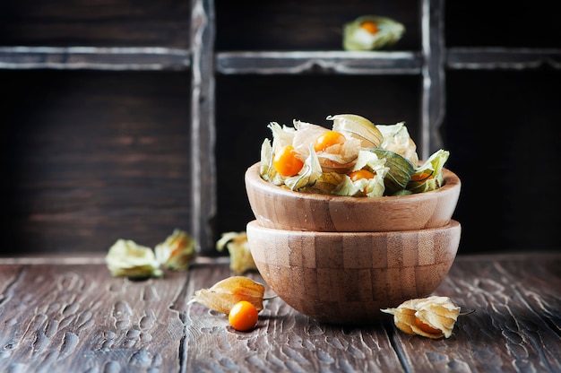 Fresh gooseberry on the wooden table