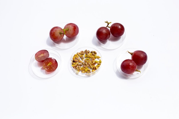 Fresh grape with seeds on white background.