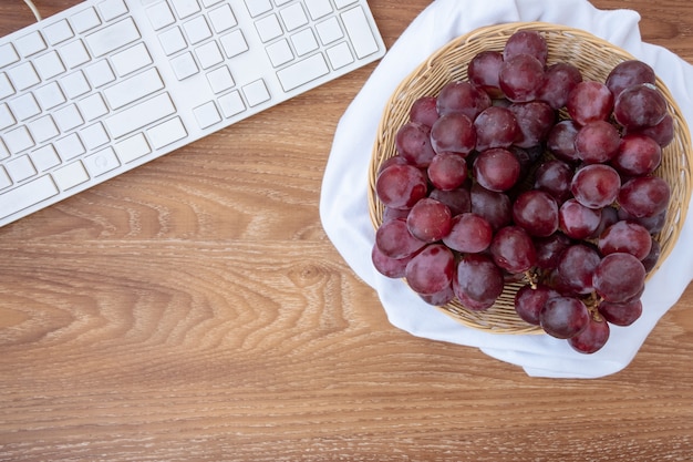 Fresh grapes on basket 